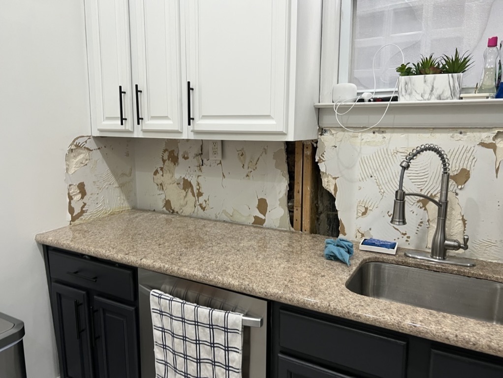 Related views of a finished kitchen backsplash and its working detail