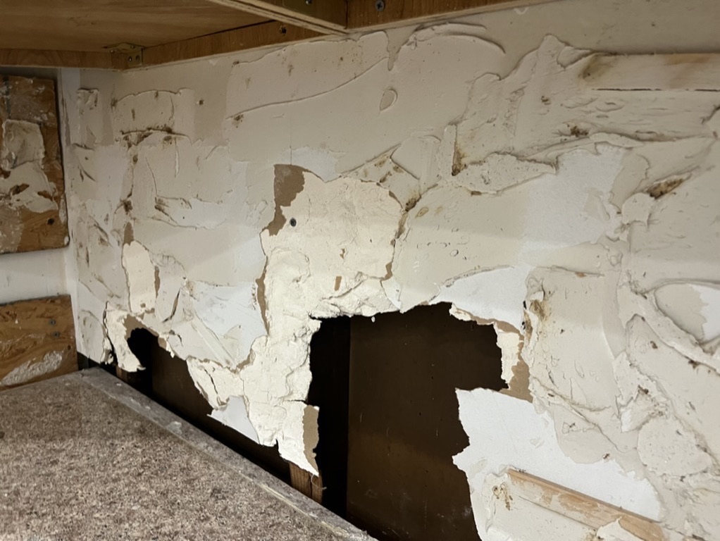 Related views of a finished kitchen backsplash and its working detail