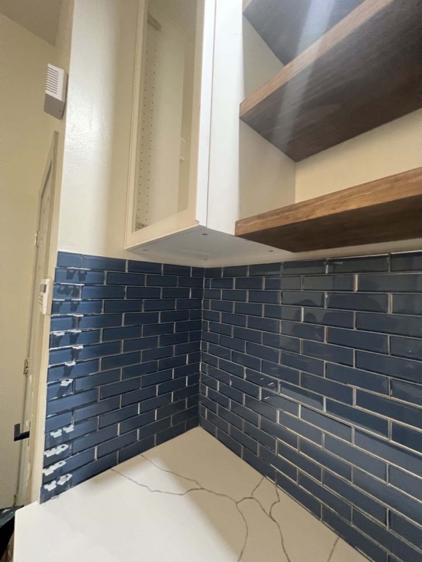 Kitchen backsplash tile finish — Tile installation & repair project photo