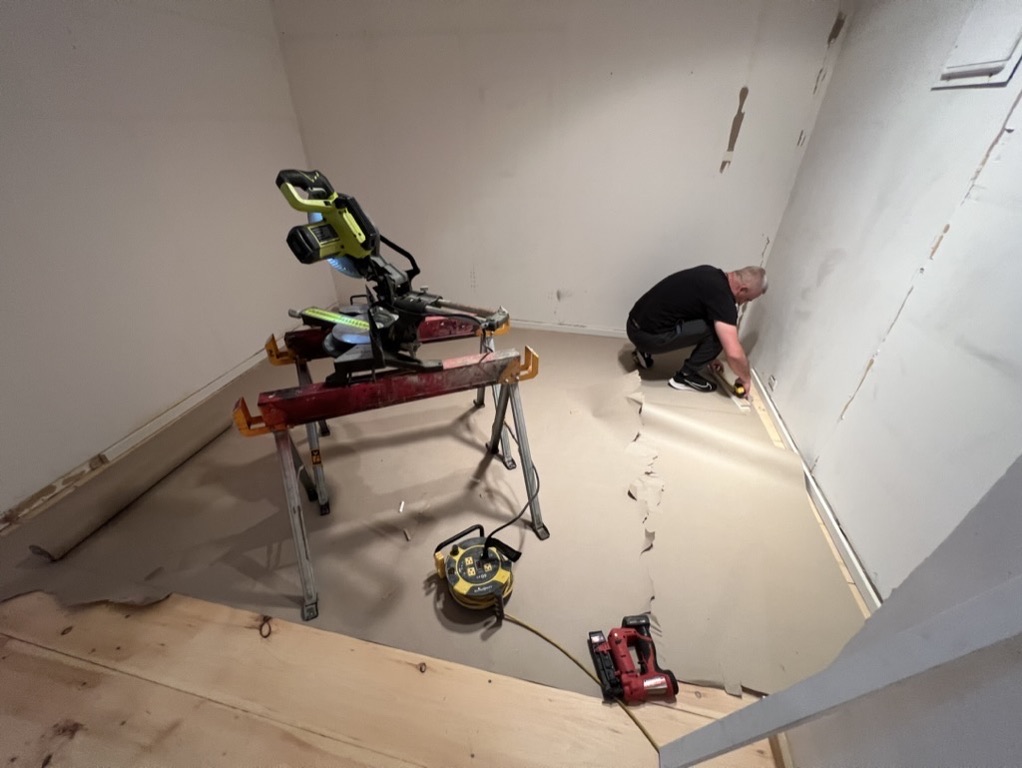 Related views of baseboard installation work