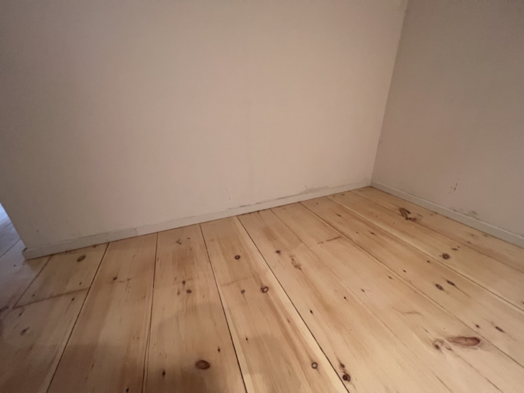 Baseboard installation and finish — Doors & trim project photo