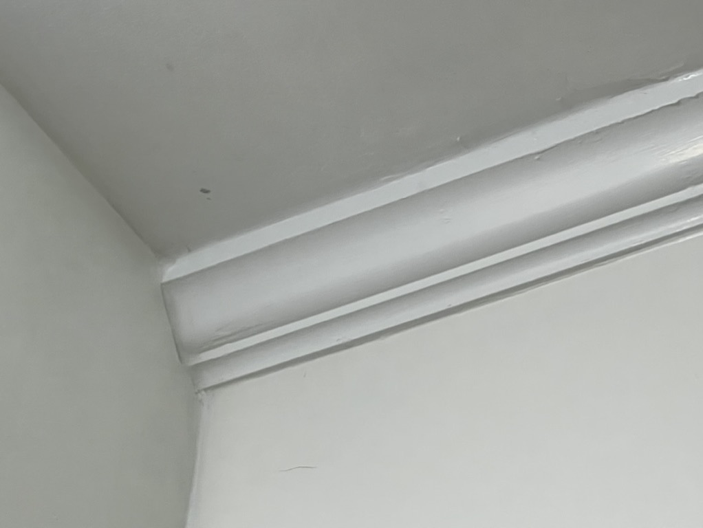 Related views of crown molding and ceiling trim
