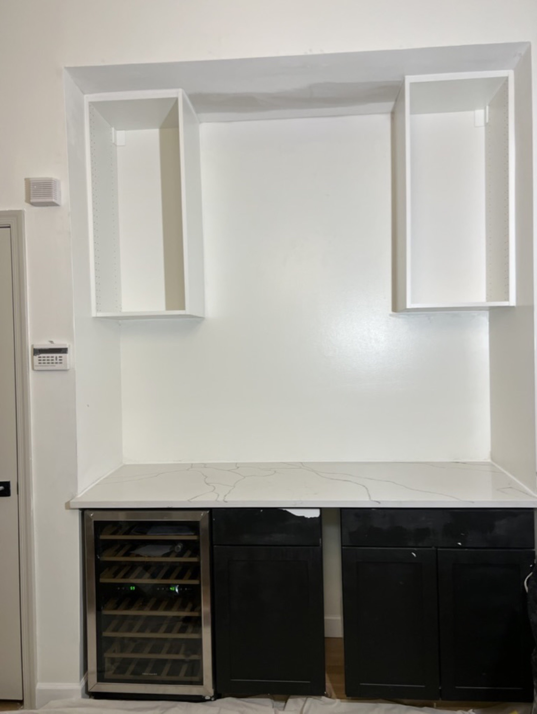 Kitchen cabinet wall finish — Interior painting project photo