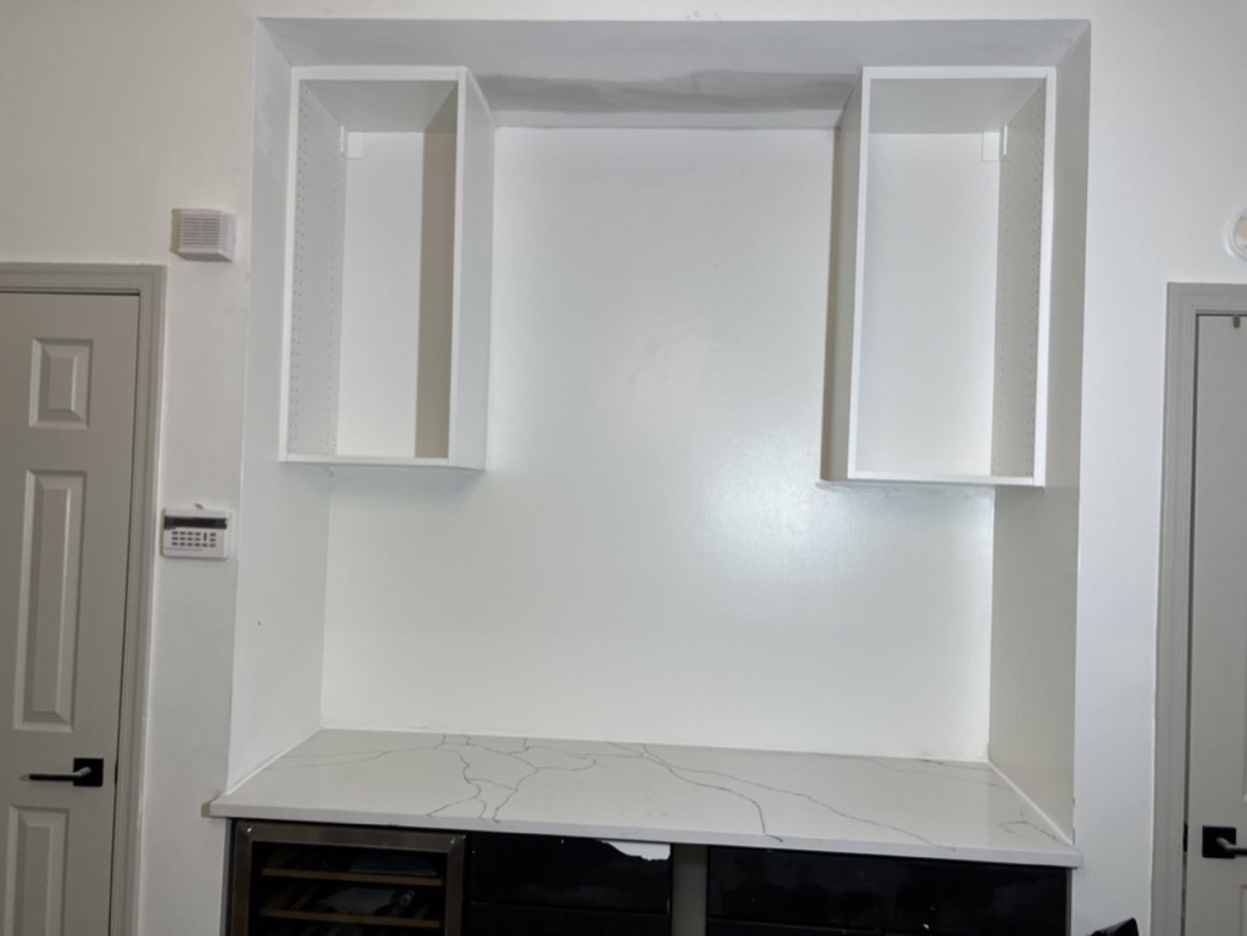 Kitchen cabinet wall finish — Interior painting project photo