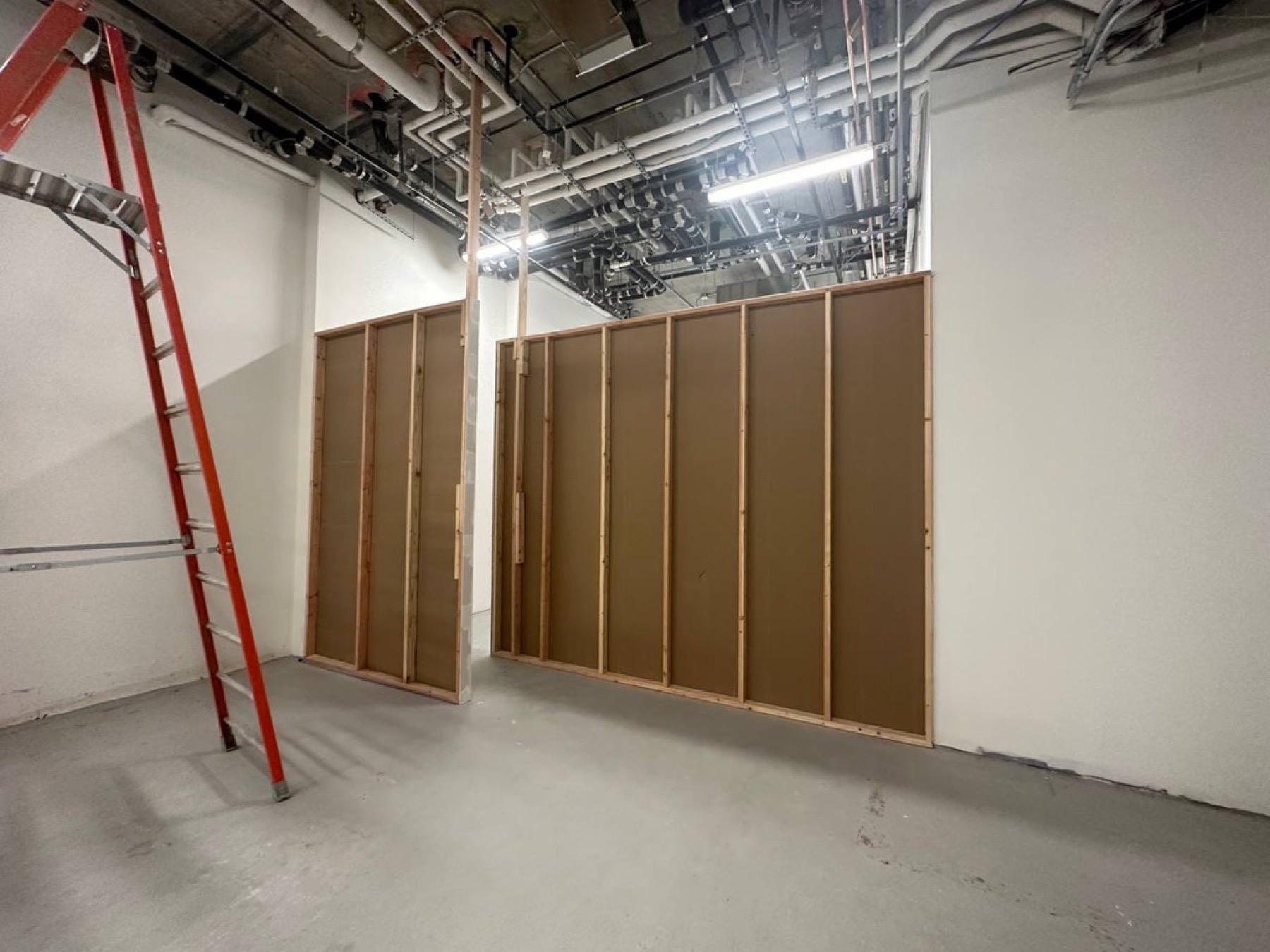 Interior wall rebuild — Drywall repair project photo