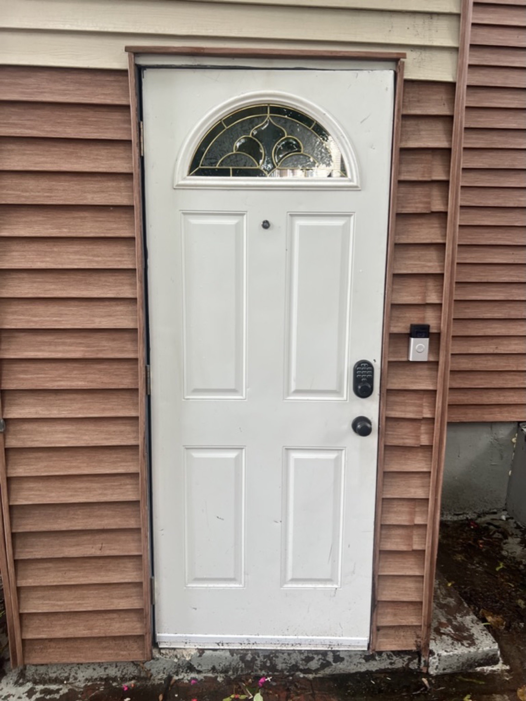 Exterior entry door and trim finish — Doors & trim project photo