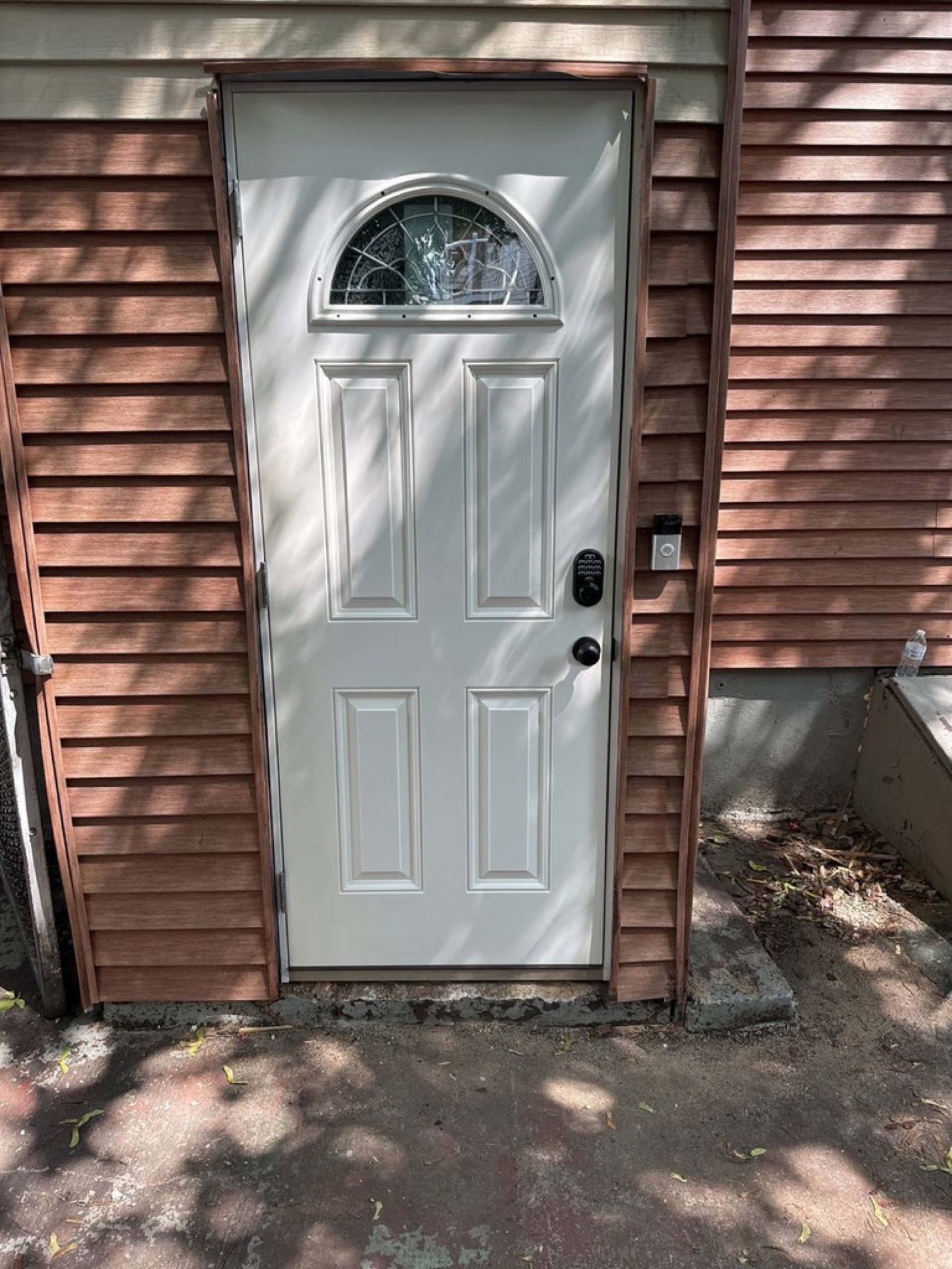 Exterior entry door and trim finish — Doors & trim project photo