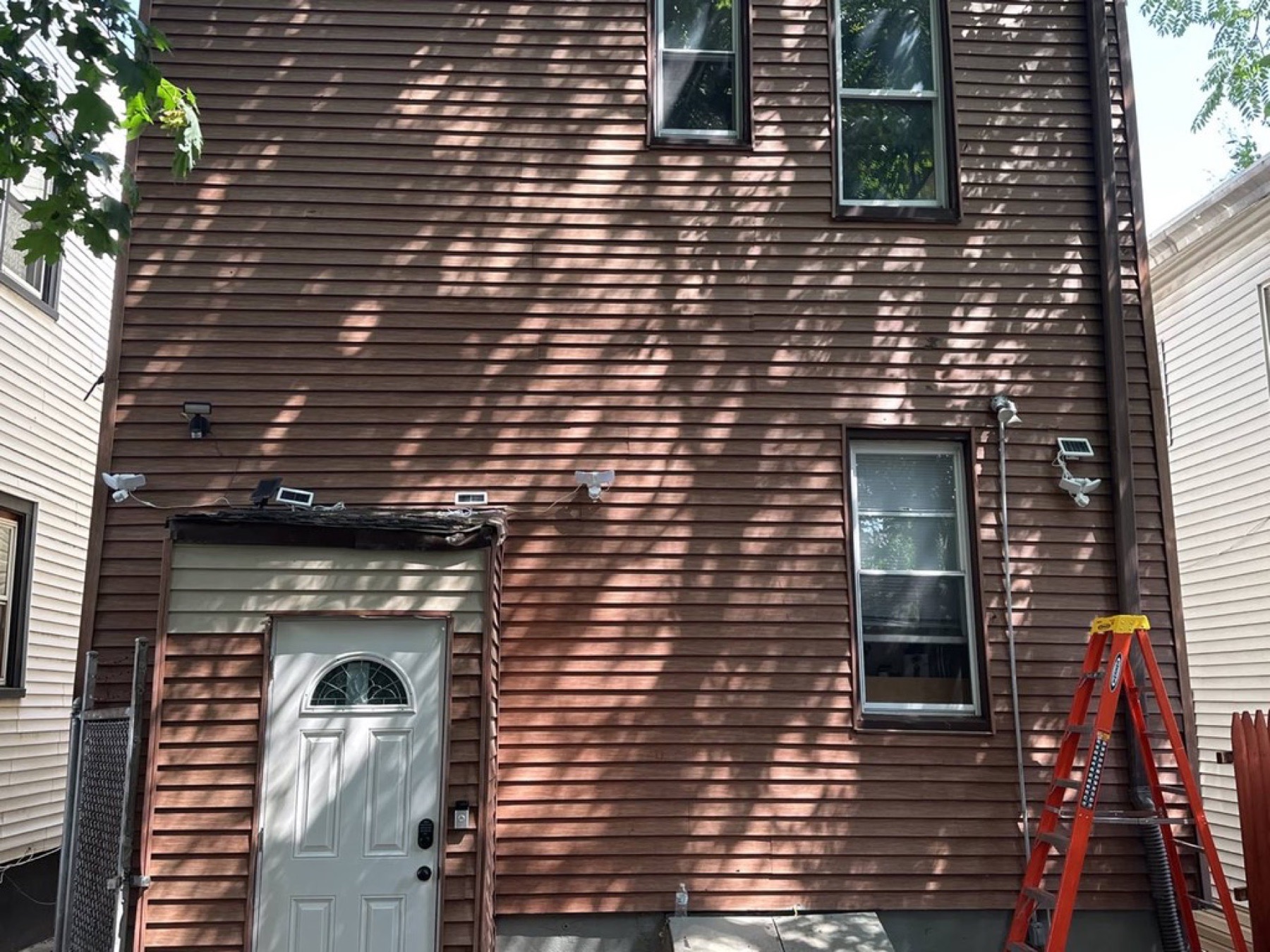 Exterior entry door and trim finish — Doors & trim project photo
