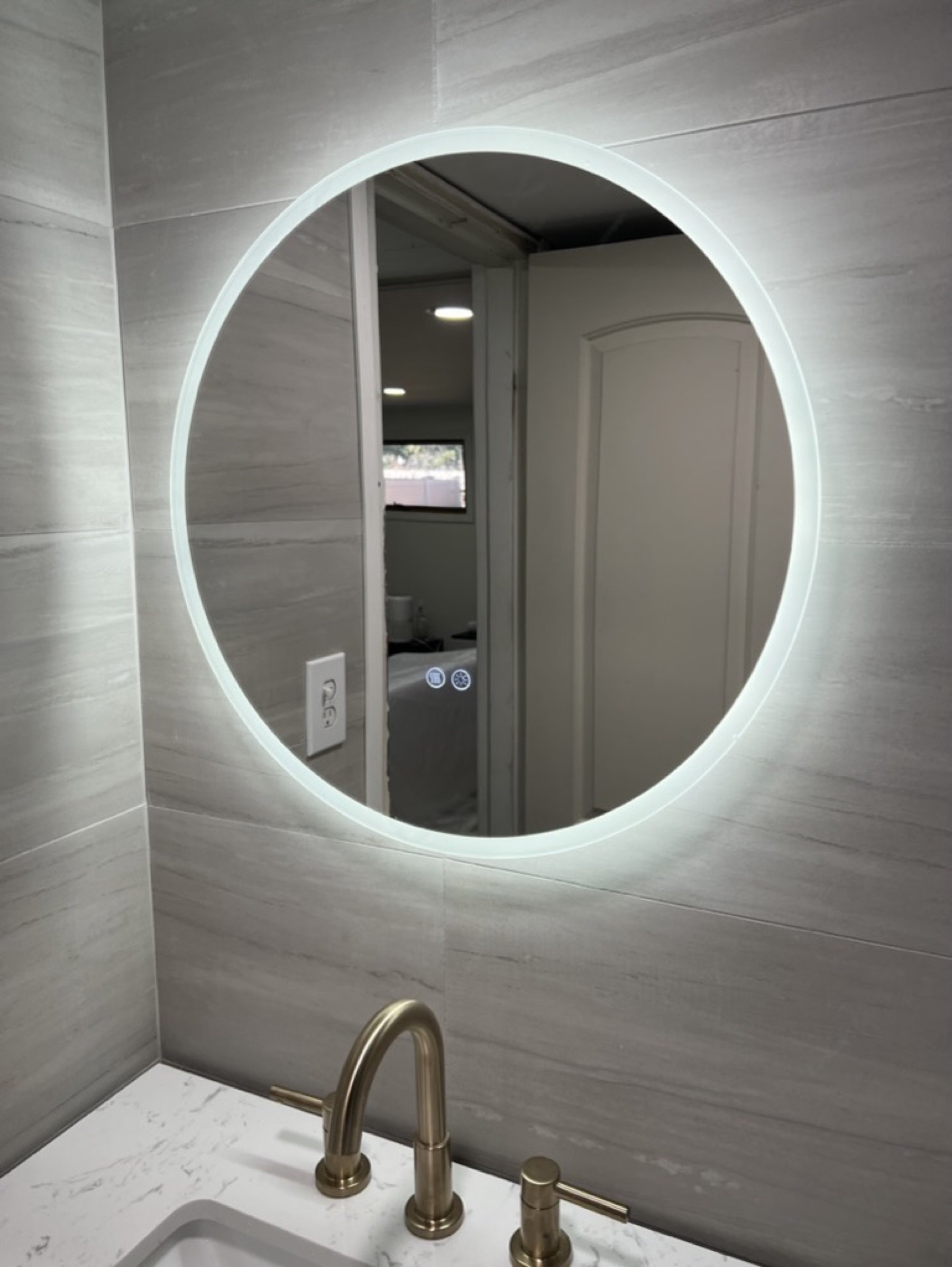 Marble-look shower tile finish — Tile installation & repair project photo
