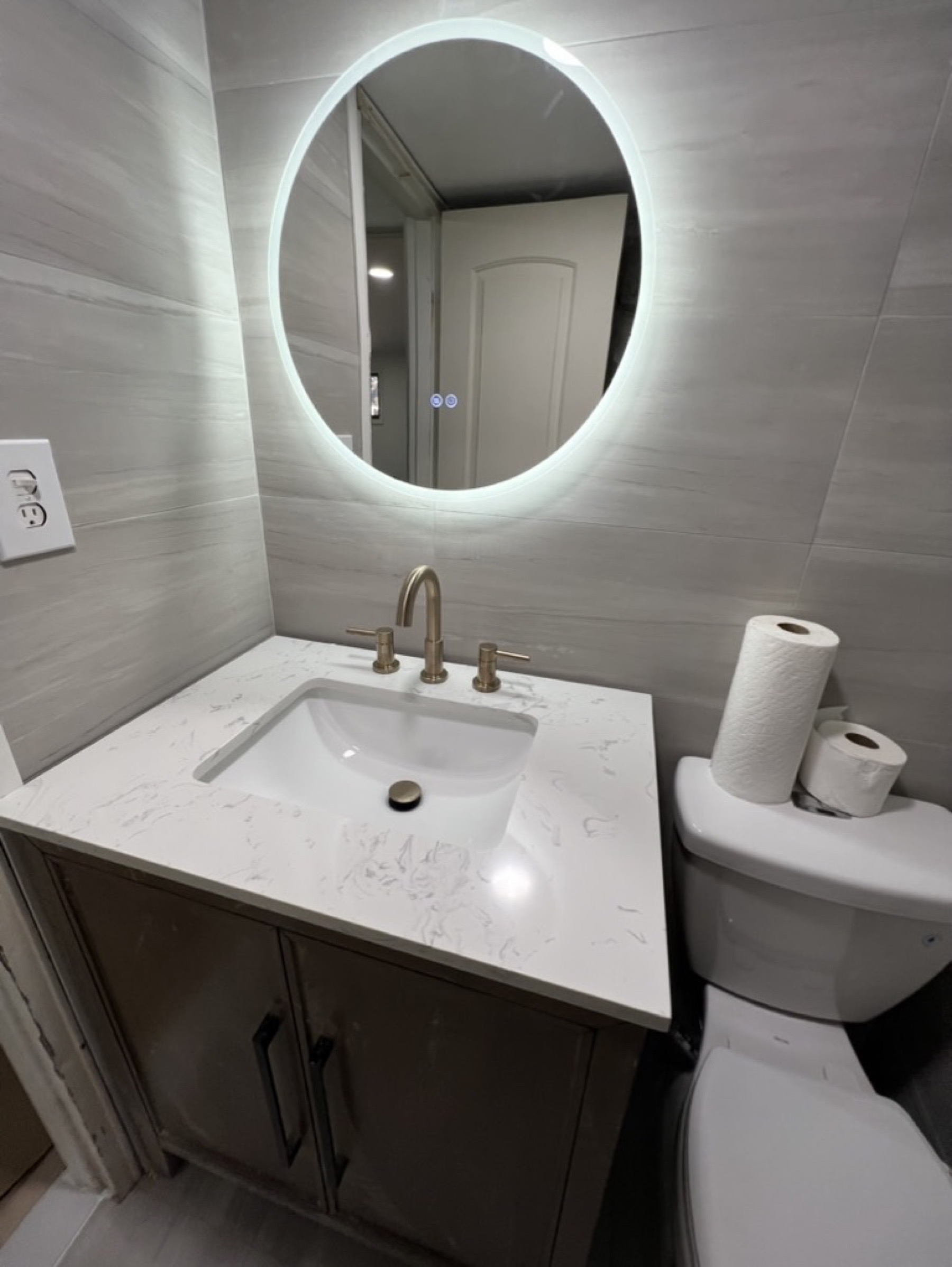 Marble-look shower tile finish — Tile installation & repair project photo