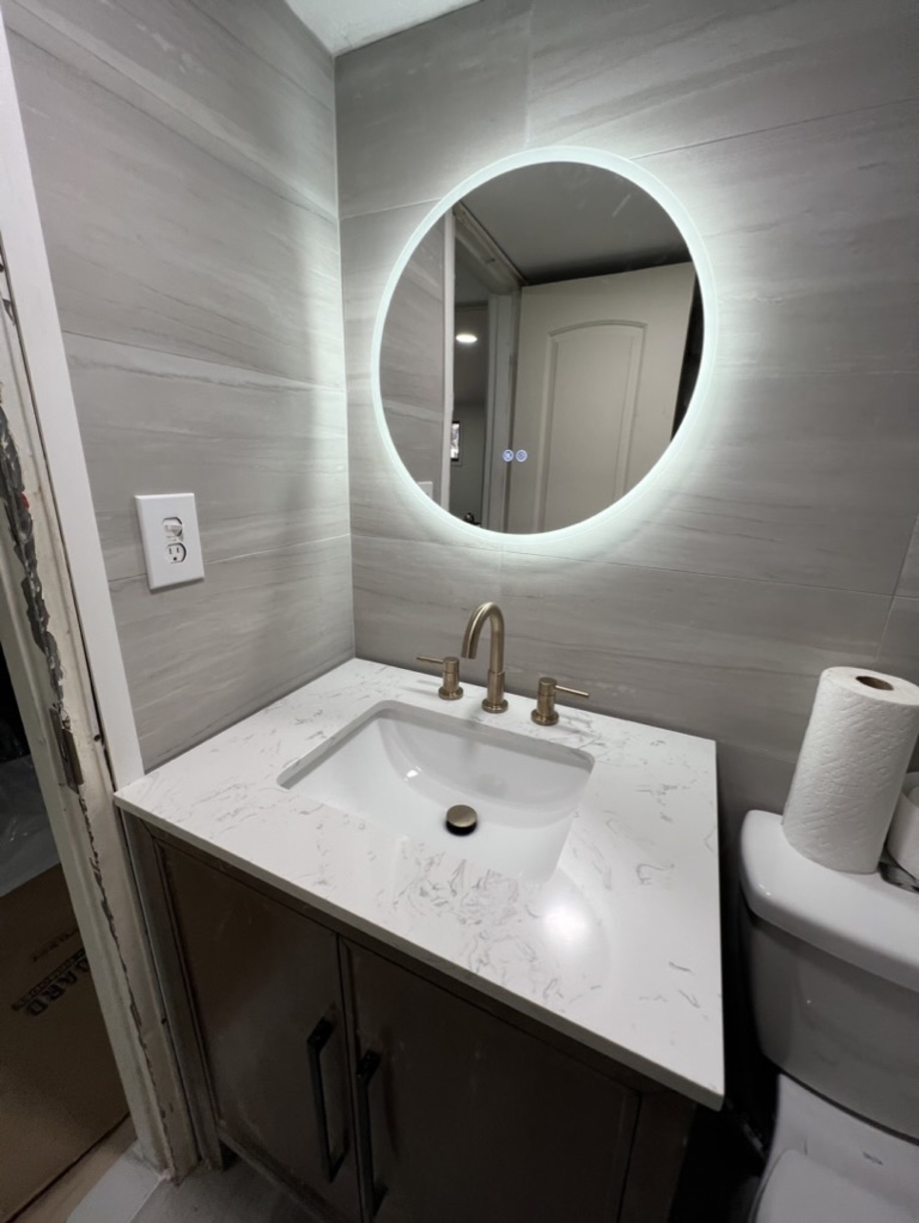 Marble-look shower tile finish — Tile installation & repair project photo