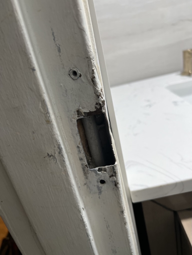 Related views of a door frame repair area