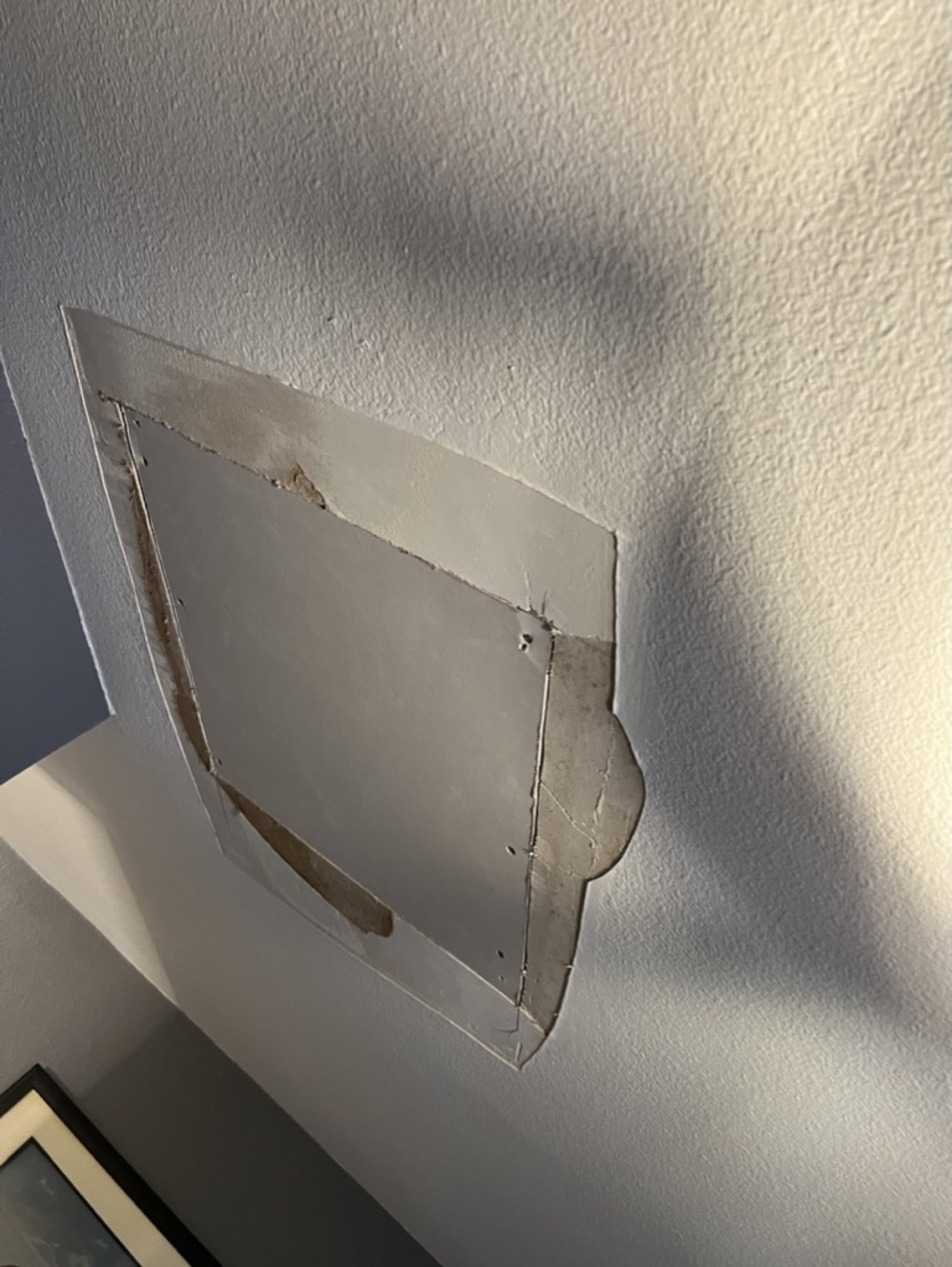 Wall patch and ceiling finish — Drywall repair project photo