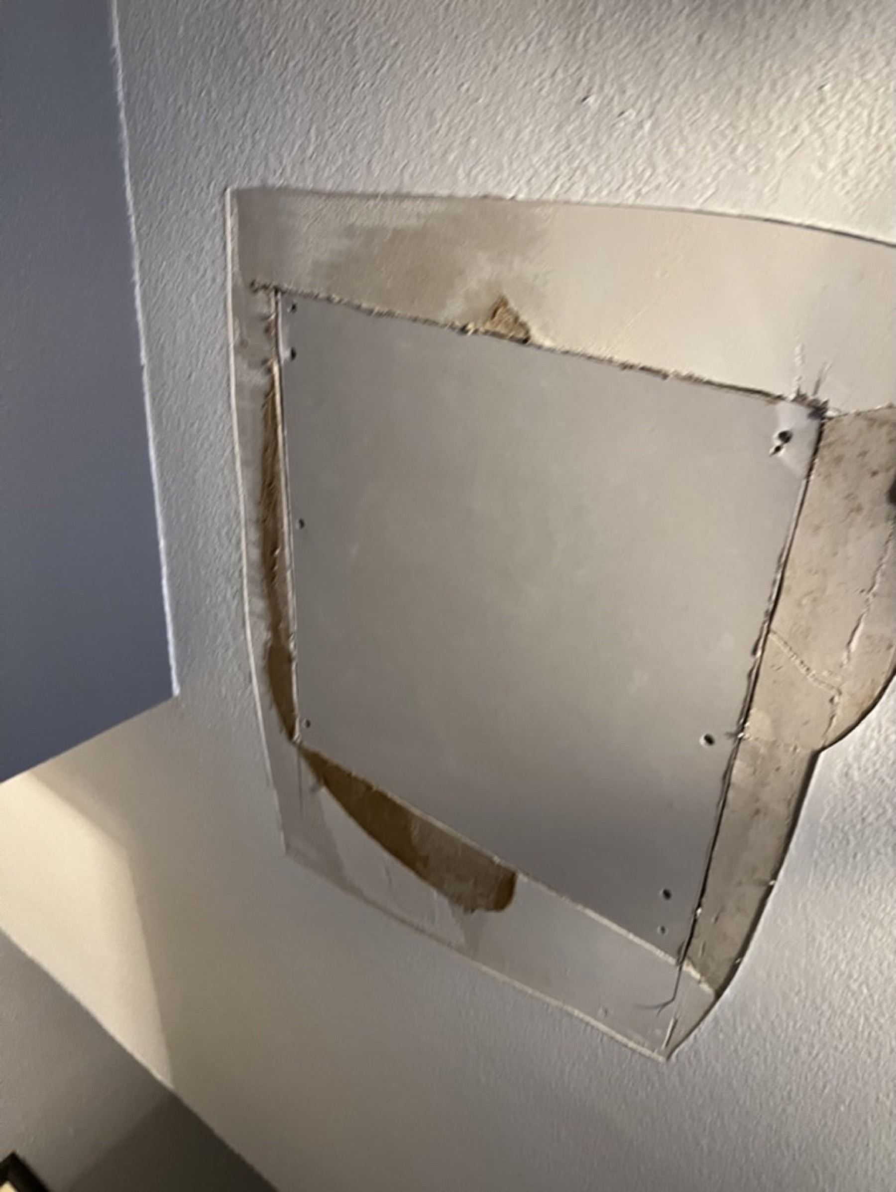 Wall patch and ceiling finish — Drywall repair project photo