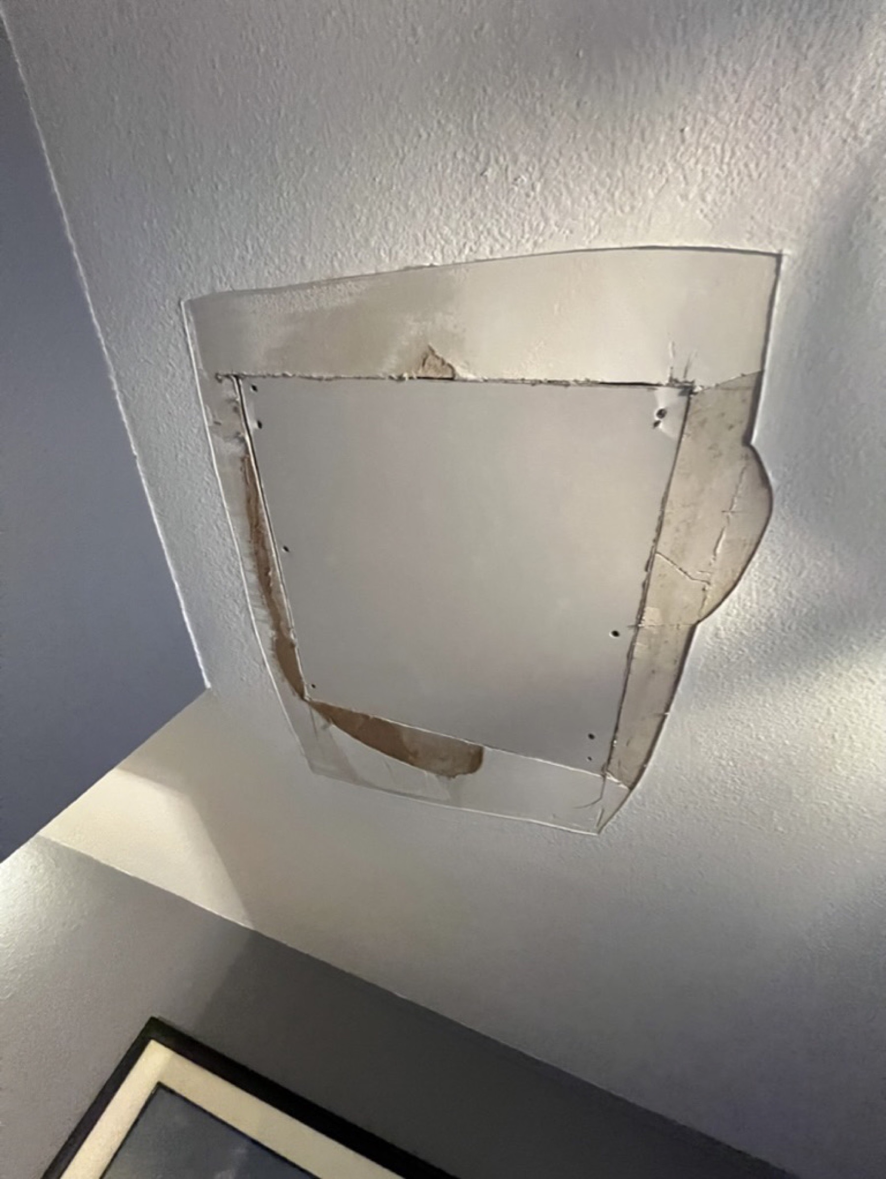 Wall patch and ceiling finish — Drywall repair project photo