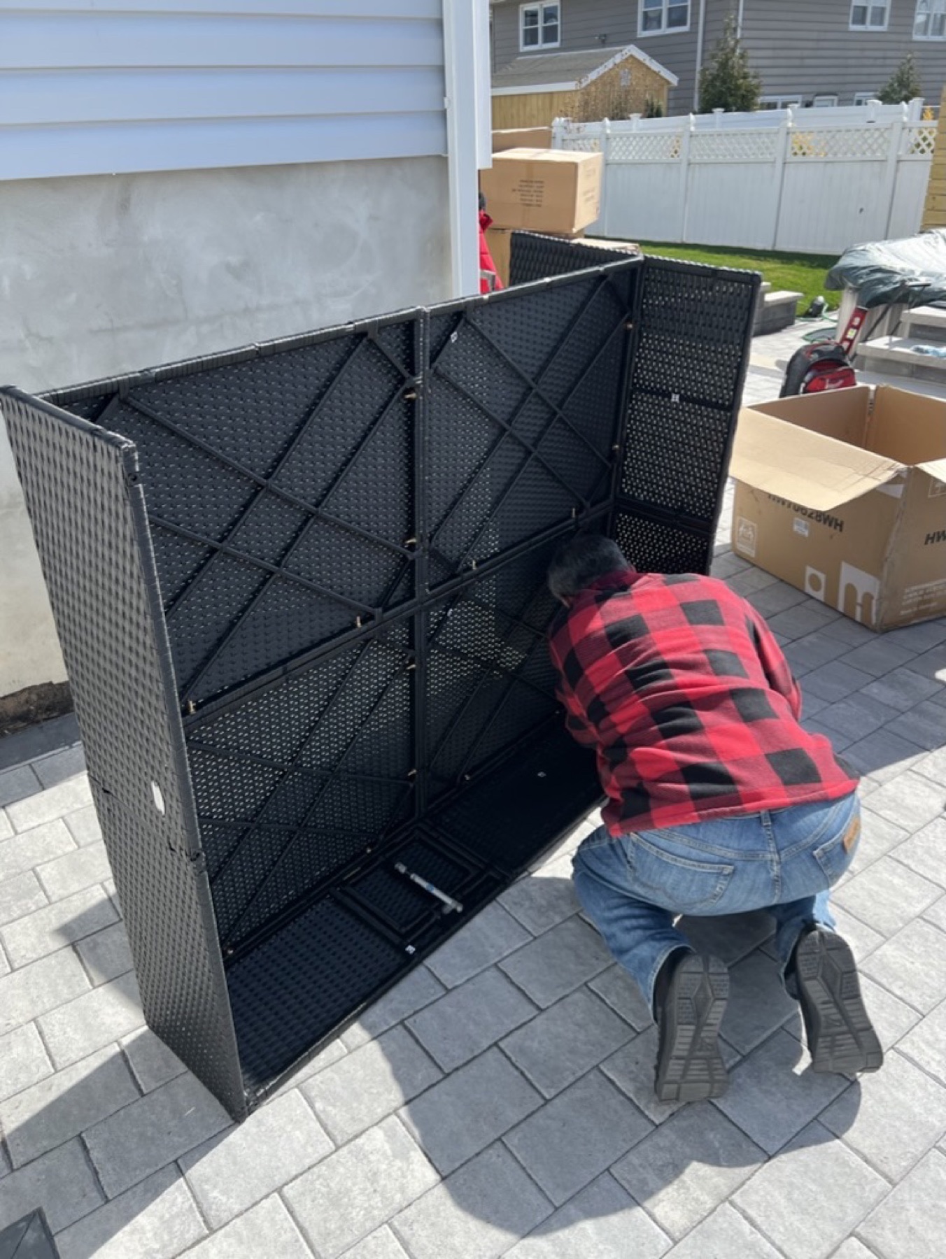 Outdoor furniture frame assembly on a paved patio